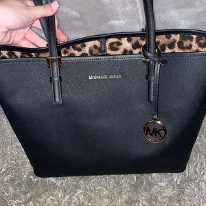 LG reversible MK tote bag.